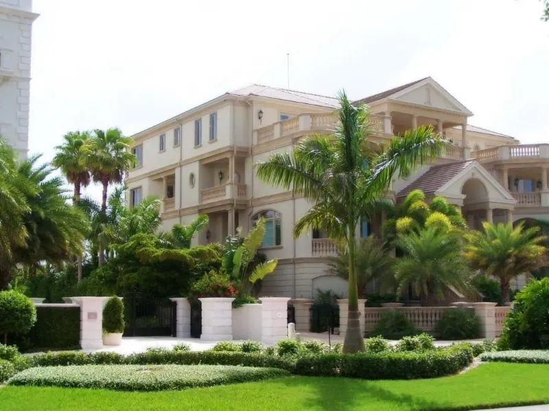 Large single-family Florida residence with one air terminal visible above the roofline