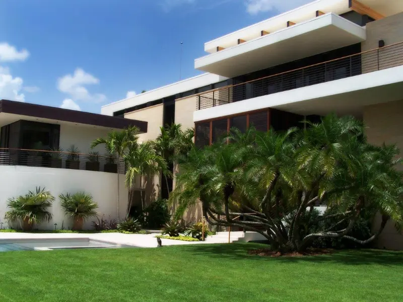 Mediterranean-style Florida home with barrel tile roof and a discreet air terminal